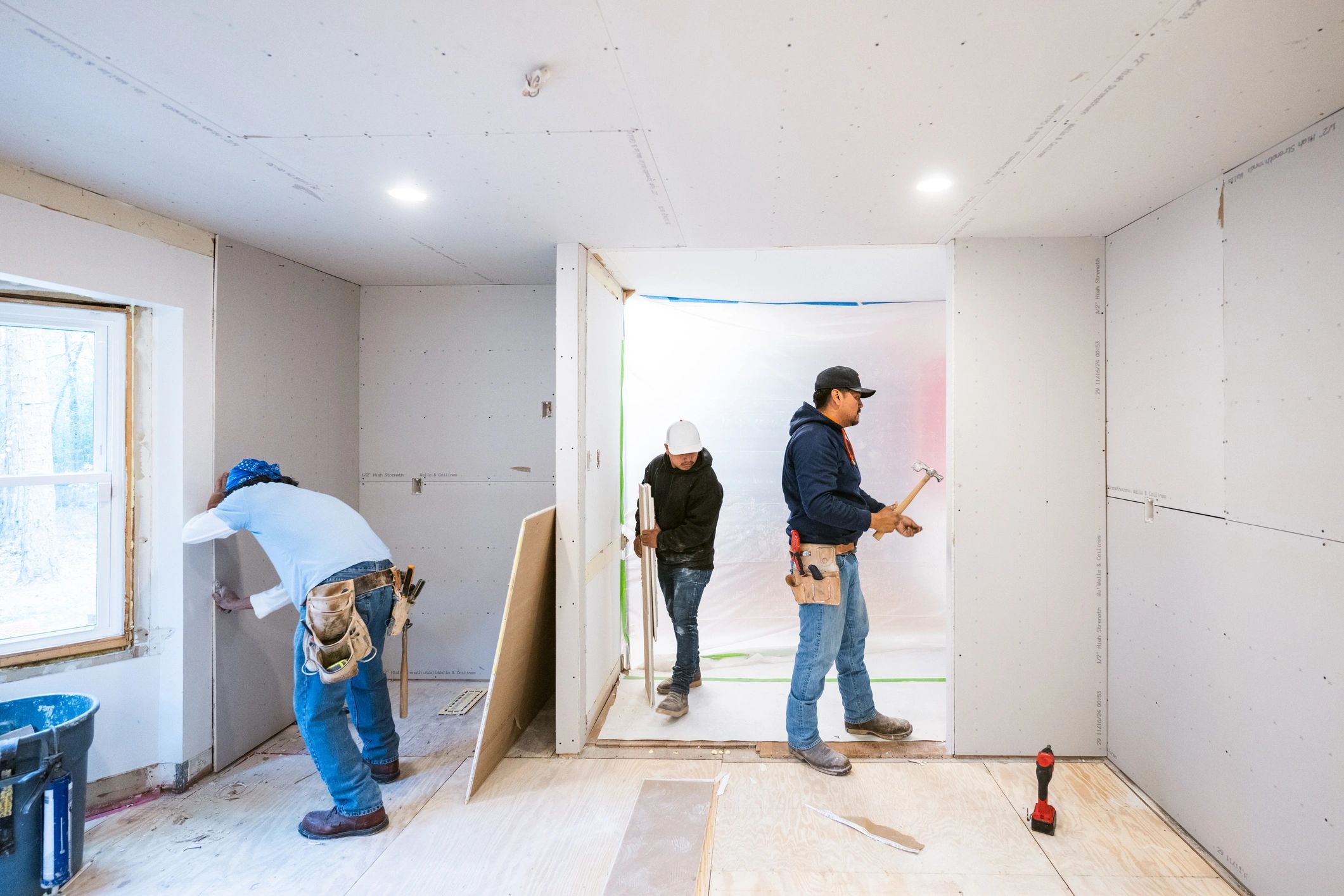 Construction crew working with professional tools on a jobsite