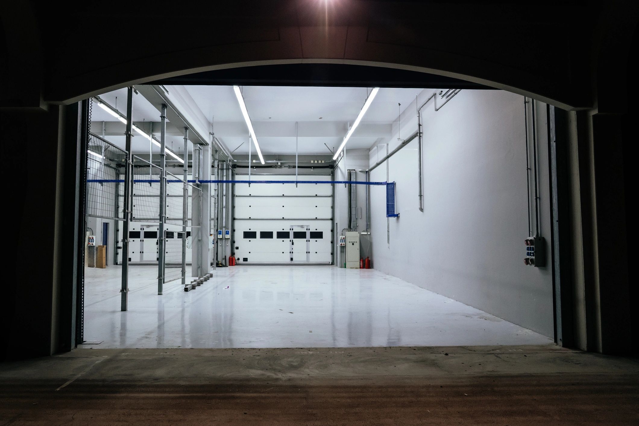 Large clean garage-like workspace for contractor setup and access gear