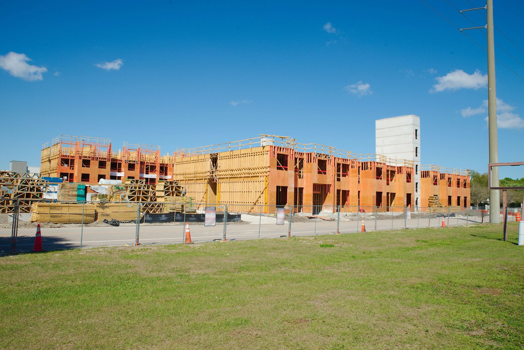 Residential framing jobsite with lumber and construction materials